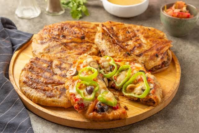 طريقة عمل حواوشي البيتزا في البيت